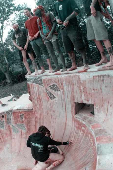 Alternative individuals have sex at a skate park while being pissed on
