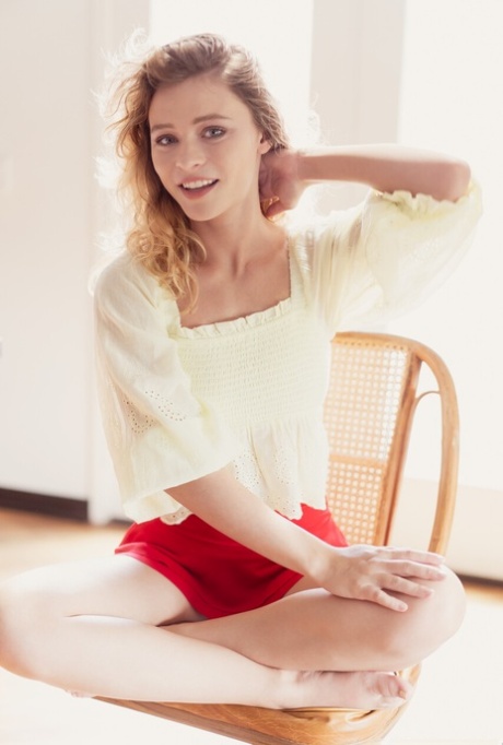 Charming beauty Alice Antoinette poses for a tease shoot in a microskirt