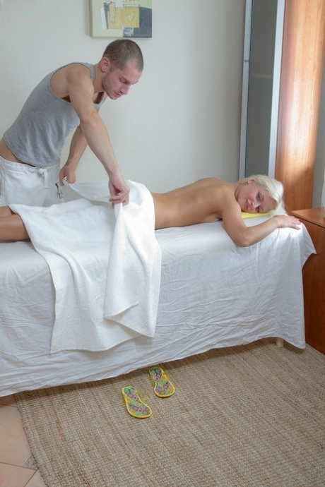 Blonde honey Stella doffs her clothes and gets rammed on a massage table