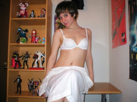 Pretty short-haired schoolgirl surprises with nude pics taken by herself