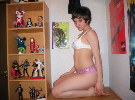 Pretty short-haired schoolgirl surprises with nude pics taken by herself