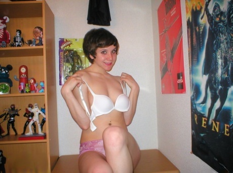 Pretty short-haired schoolgirl surprises with nude pics taken by herself