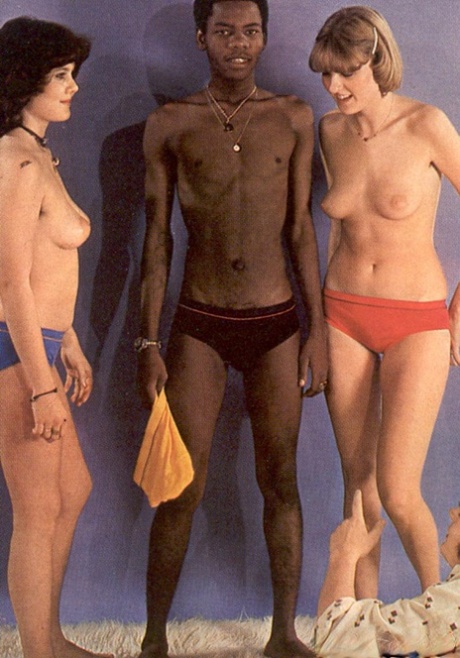 Two cute girls get their hairy cunts fucked by a BBC in a vintage threesome