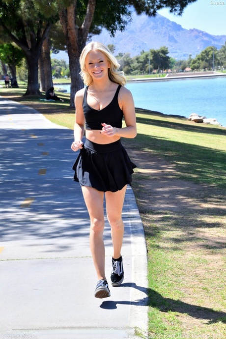 Beautiful young blonde Sveda shows off her big booty & her tiny tits