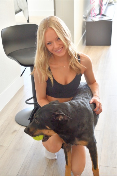 Beautiful young blonde Sveda shows off her big booty & her tiny tits