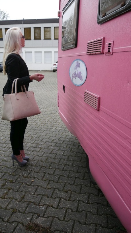 Hot German pornstar gives head and rides a long old dick in a pink trailer
