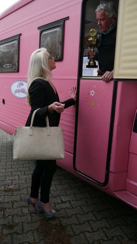 Hot German pornstar gives head and rides a long old dick in a pink trailer