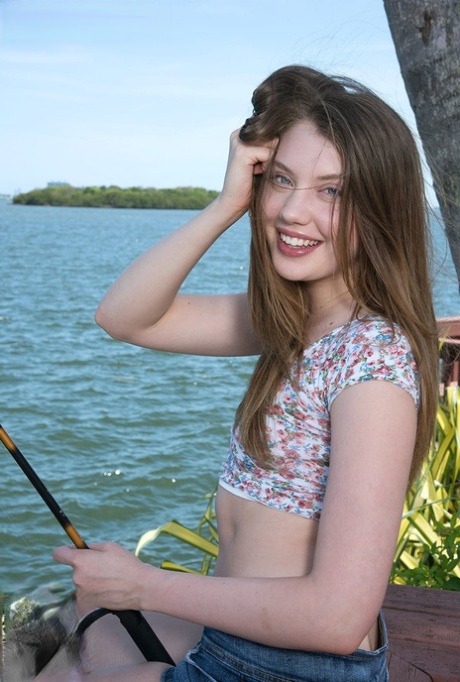 Charming teen Elena Koshka shows off her small tits  spreads her shaved pussy