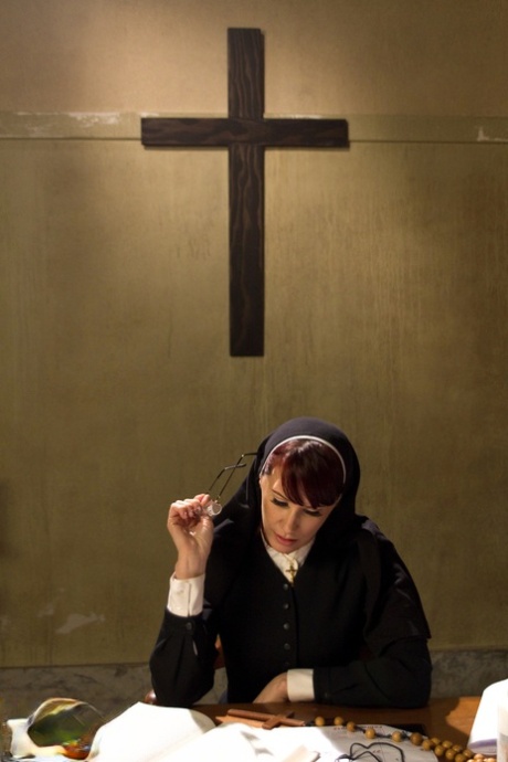 Slutty nun Maitresse Madeline Marlowe punishes and spanks a submissive priest