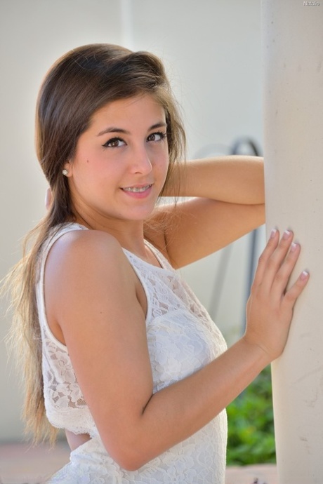 Gorgeous teen Natalie exposes her tasty clam and slides a fat dildo in it